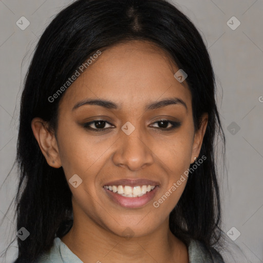 Joyful latino young-adult female with long  black hair and brown eyes