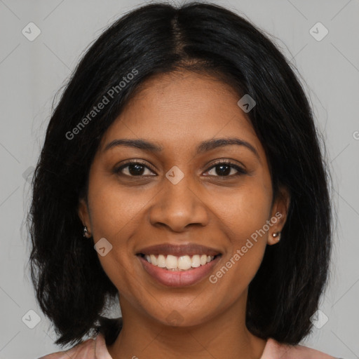 Joyful black young-adult female with medium  black hair and brown eyes