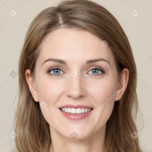 Joyful white young-adult female with long  brown hair and green eyes