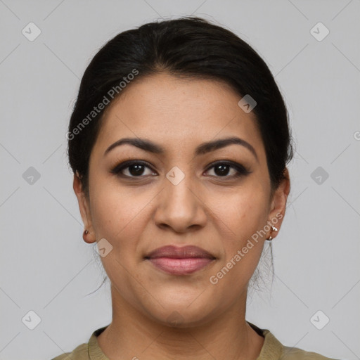 Joyful latino young-adult female with medium  brown hair and brown eyes