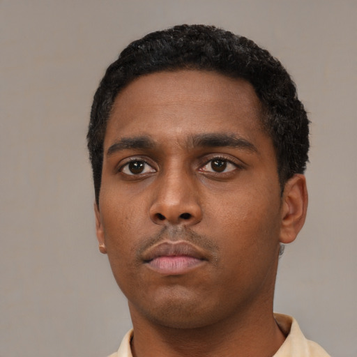Neutral black young-adult male with short  black hair and brown eyes