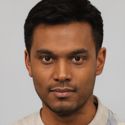 Neutral latino young-adult male with short  black hair and brown eyes