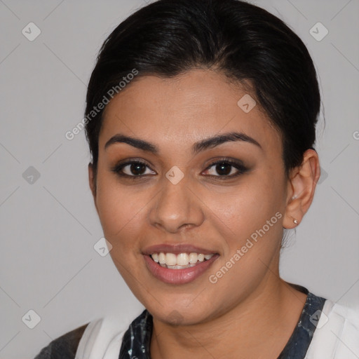 Joyful latino young-adult female with medium  brown hair and brown eyes