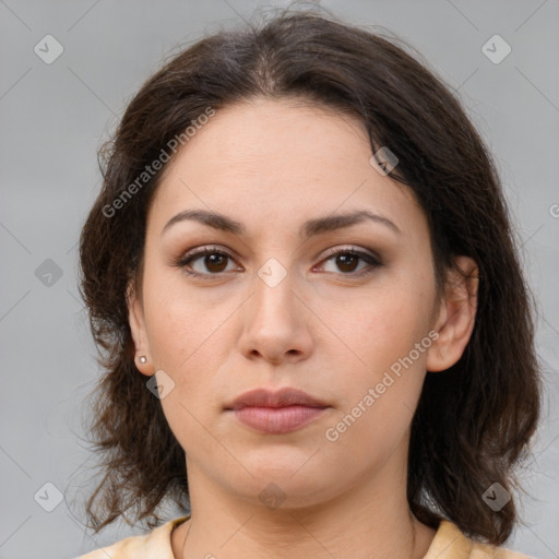 Neutral white young-adult female with medium  brown hair and brown eyes