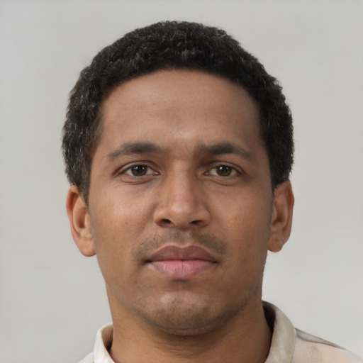 Neutral black young-adult male with short  brown hair and brown eyes