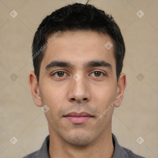 Neutral white young-adult male with short  black hair and brown eyes
