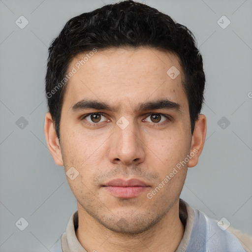 Neutral white young-adult male with short  black hair and brown eyes