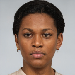 Neutral black young-adult female with short  brown hair and brown eyes