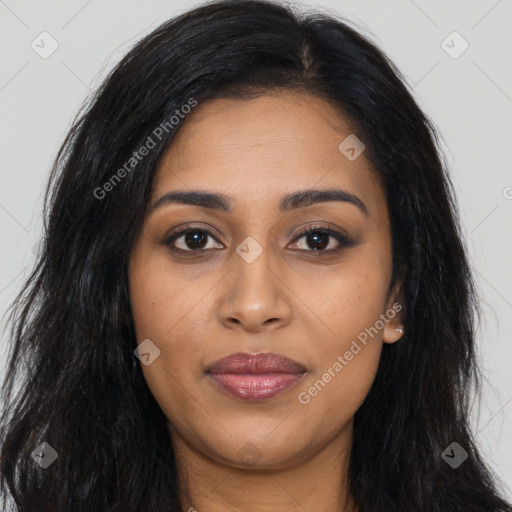 Joyful latino young-adult female with long  brown hair and brown eyes