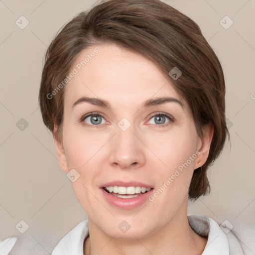 Joyful white young-adult female with medium  brown hair and green eyes