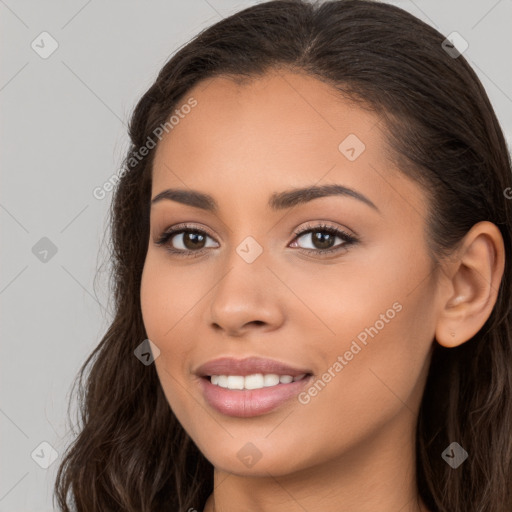 Joyful white young-adult female with long  brown hair and brown eyes