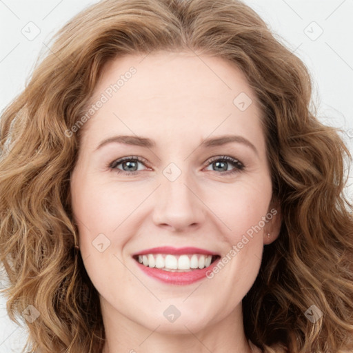 Joyful white young-adult female with long  brown hair and green eyes