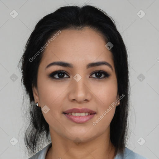 Joyful latino young-adult female with medium  brown hair and brown eyes