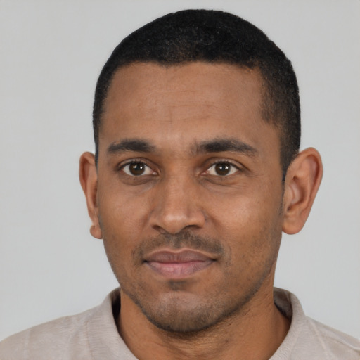 Neutral black young-adult male with short  black hair and brown eyes