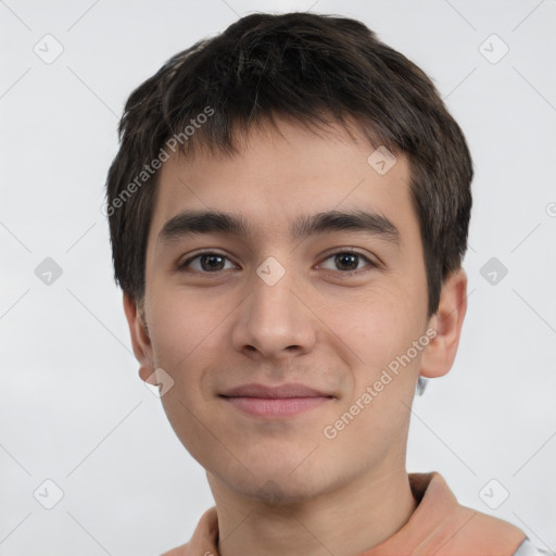 Joyful white young-adult male with short  black hair and brown eyes