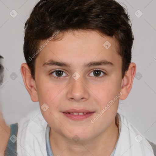 Joyful white child male with short  brown hair and brown eyes