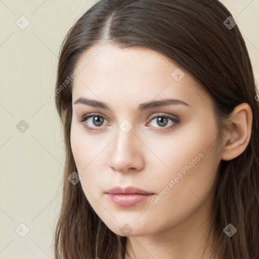 Neutral white young-adult female with long  brown hair and brown eyes