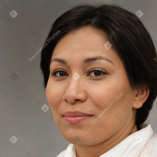 Joyful white adult female with short  brown hair and brown eyes