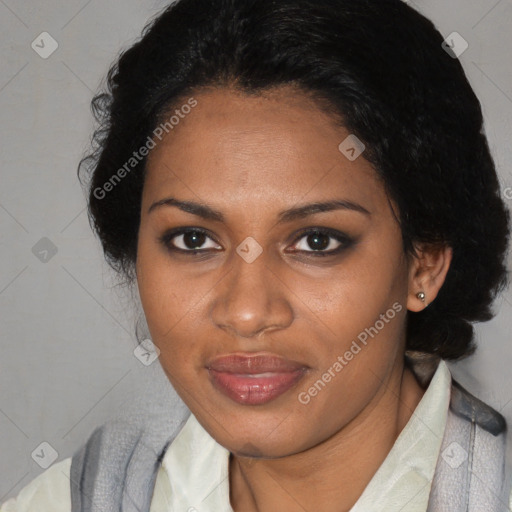 Joyful black adult female with medium  black hair and brown eyes