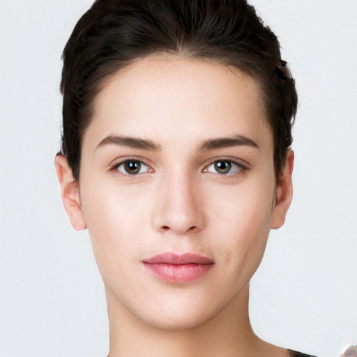 Neutral white young-adult female with short  brown hair and brown eyes