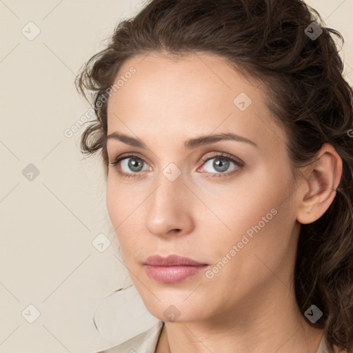 Neutral white young-adult female with medium  brown hair and green eyes