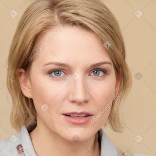 Joyful white young-adult female with medium  brown hair and blue eyes