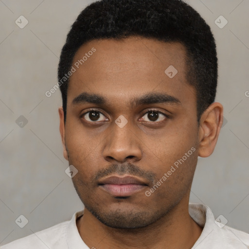 Neutral latino young-adult male with short  black hair and brown eyes