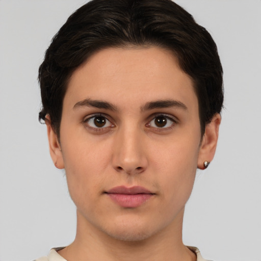 Neutral white young-adult female with short  brown hair and brown eyes