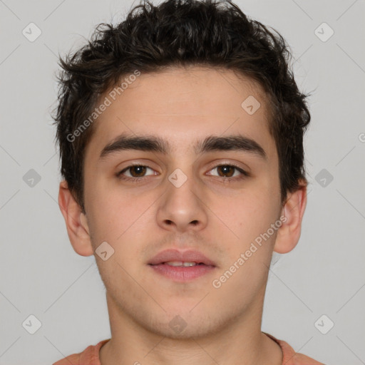 Neutral white young-adult male with short  brown hair and brown eyes