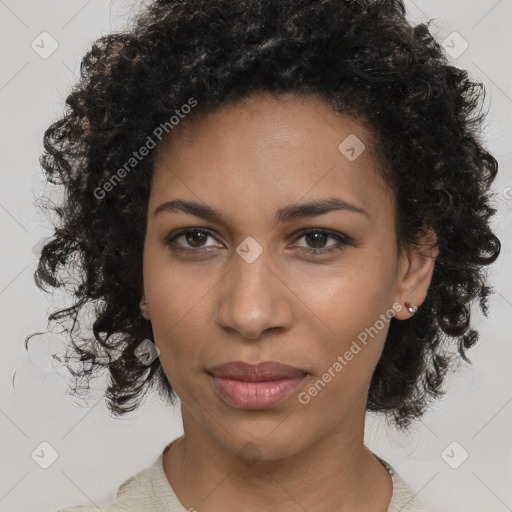 Joyful black young-adult female with medium  brown hair and brown eyes