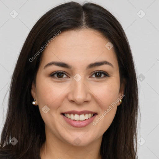 Joyful white young-adult female with long  brown hair and brown eyes