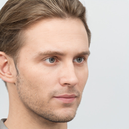 Neutral white young-adult male with short  brown hair and grey eyes