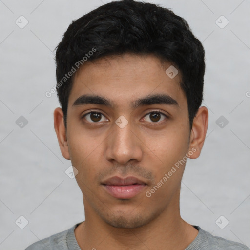 Neutral latino young-adult male with short  black hair and brown eyes