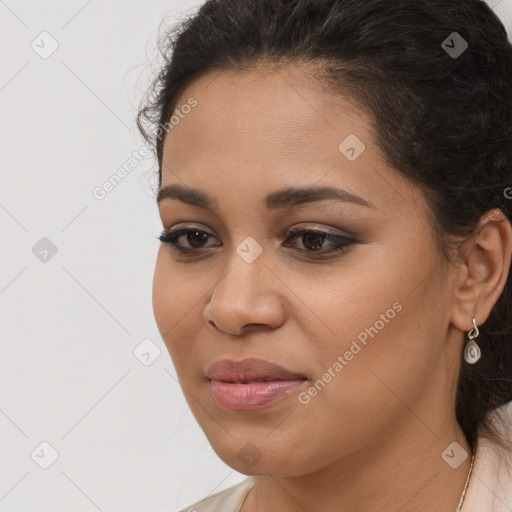 Joyful latino young-adult female with long  brown hair and brown eyes