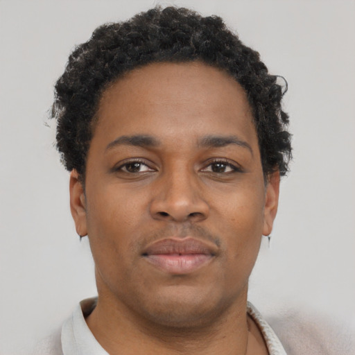 Neutral black young-adult male with short  brown hair and brown eyes