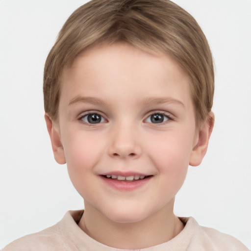 Joyful white child female with short  brown hair and grey eyes