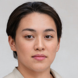 Neutral asian young-adult female with medium  brown hair and brown eyes