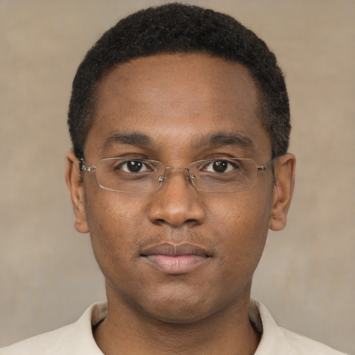 Neutral black young-adult male with short  brown hair and brown eyes