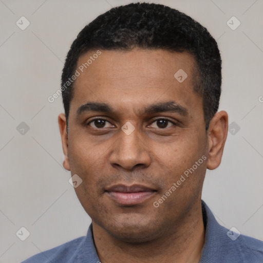 Neutral black young-adult male with short  black hair and brown eyes