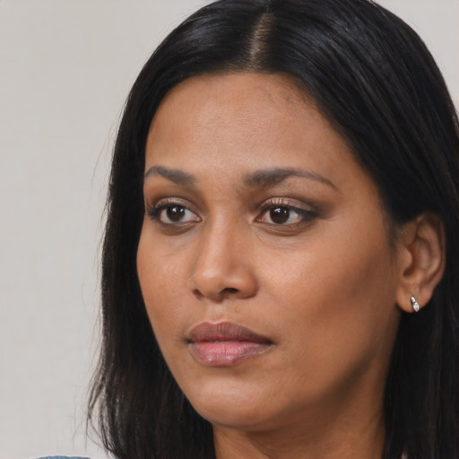 Neutral asian young-adult female with long  black hair and brown eyes