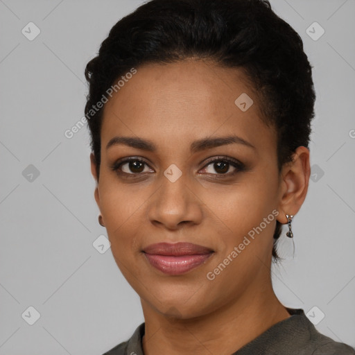 Joyful latino young-adult female with short  black hair and brown eyes