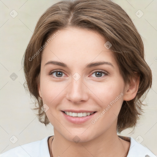 Joyful white young-adult female with medium  brown hair and green eyes