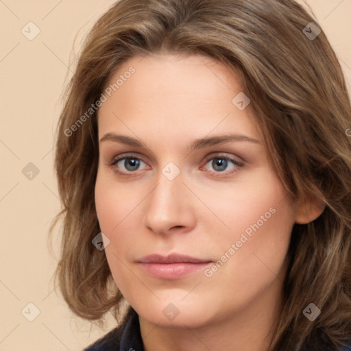 Neutral white young-adult female with long  brown hair and brown eyes