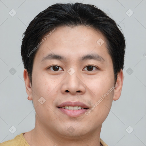 Joyful asian young-adult male with short  brown hair and brown eyes