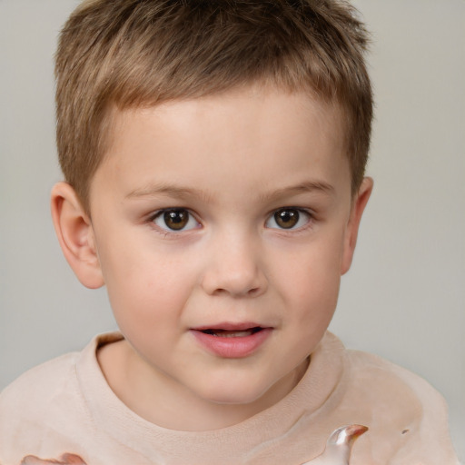 Joyful white child male with short  brown hair and brown eyes