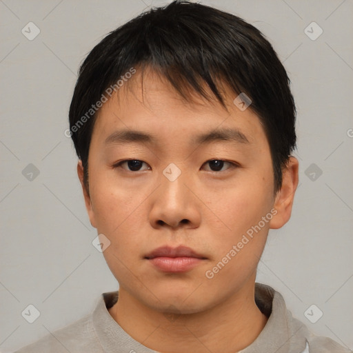 Neutral asian young-adult male with short  brown hair and brown eyes