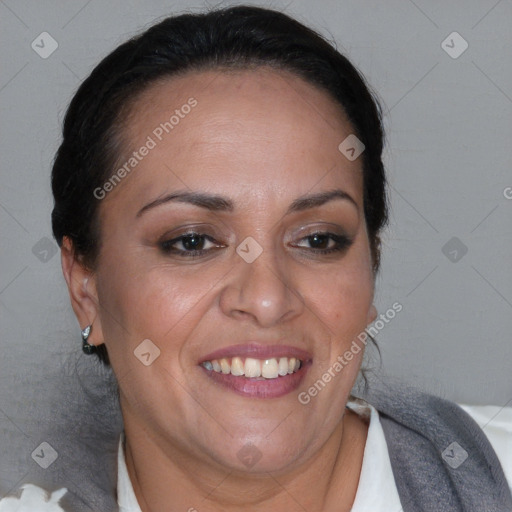 Joyful black adult female with medium  brown hair and brown eyes