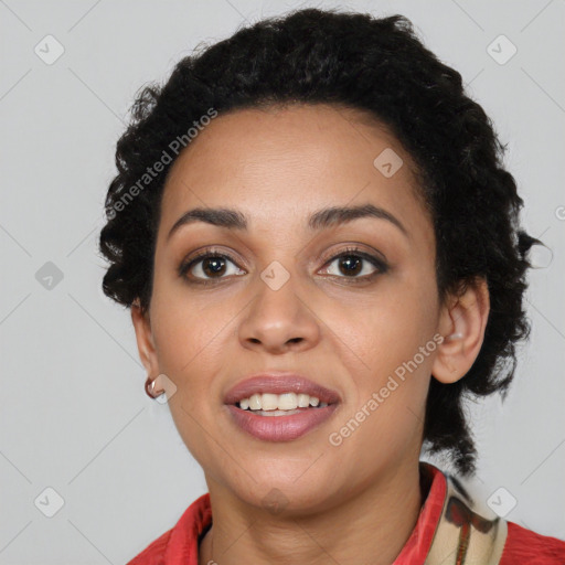 Joyful latino young-adult female with short  black hair and brown eyes