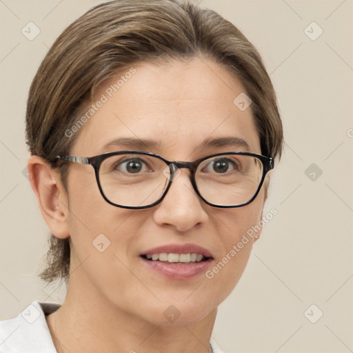 Joyful white adult female with medium  brown hair and brown eyes