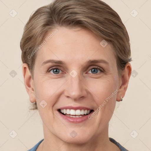 Joyful white young-adult female with short  brown hair and grey eyes